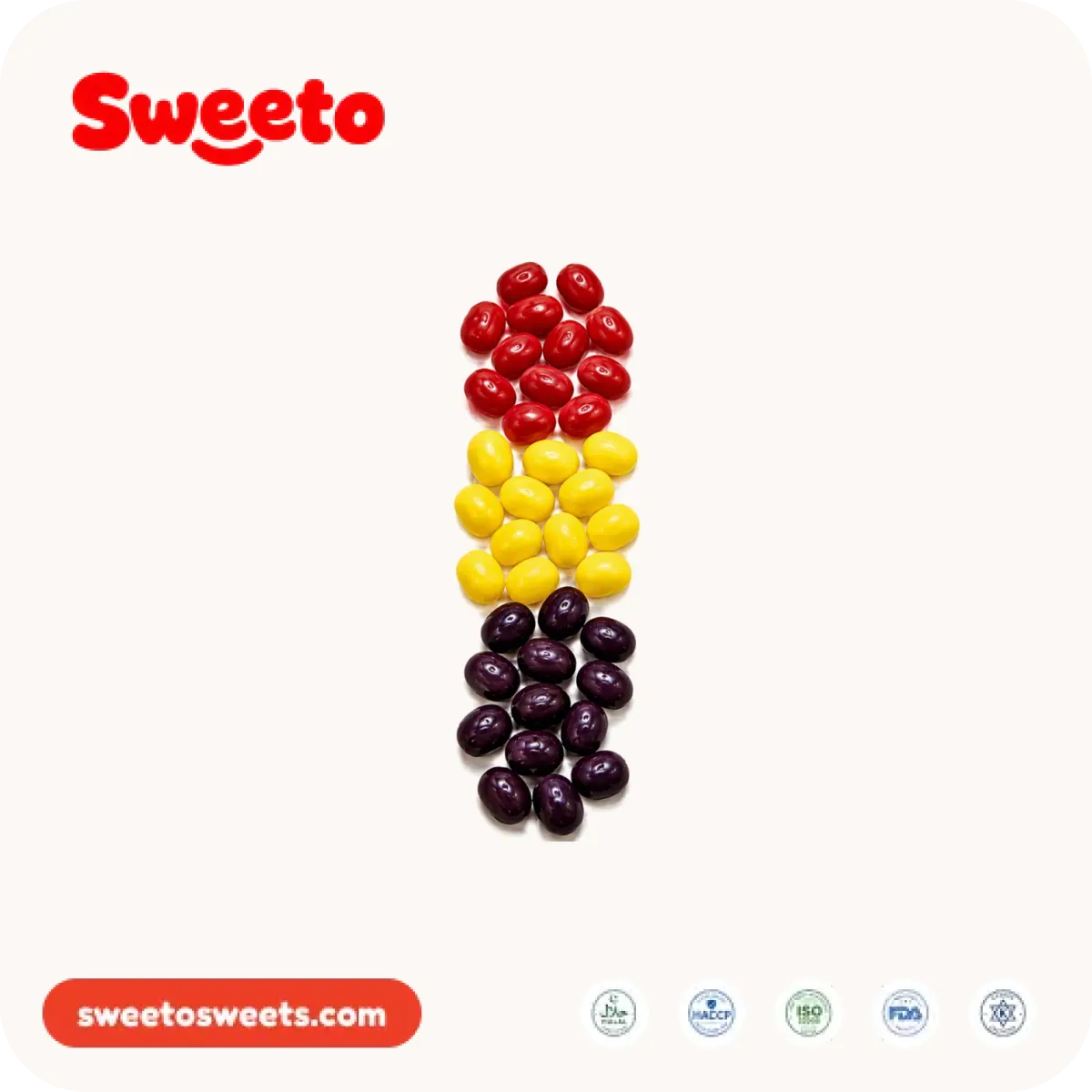 Grageas masticables de fruta brillantes de Sweeto Sweets en bloques de color rojo, amarillo y morado oscuro