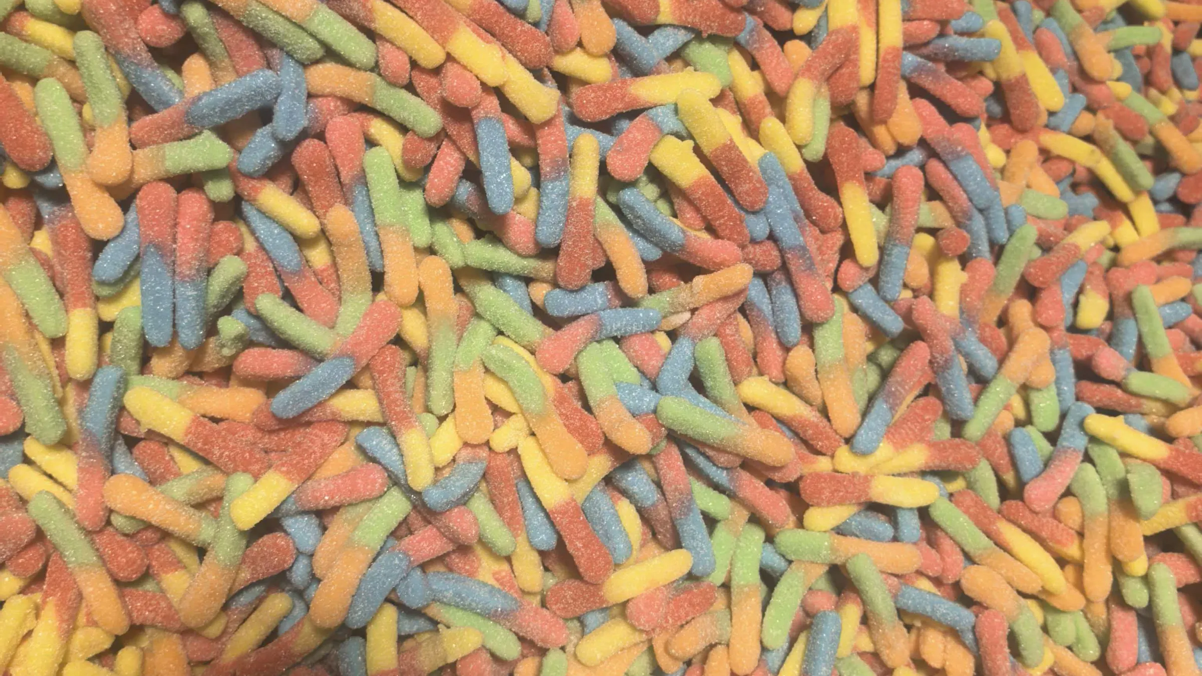 3.Modern servo depositor machine producing dual-color gummy worms