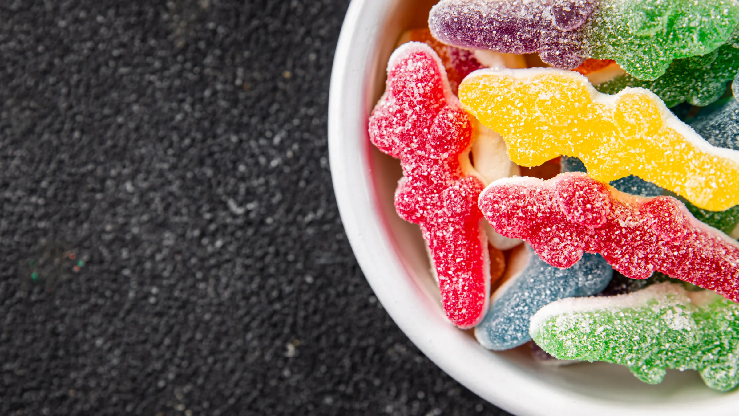2.Tray of gummy candy samples in different shapes and colors for product approval