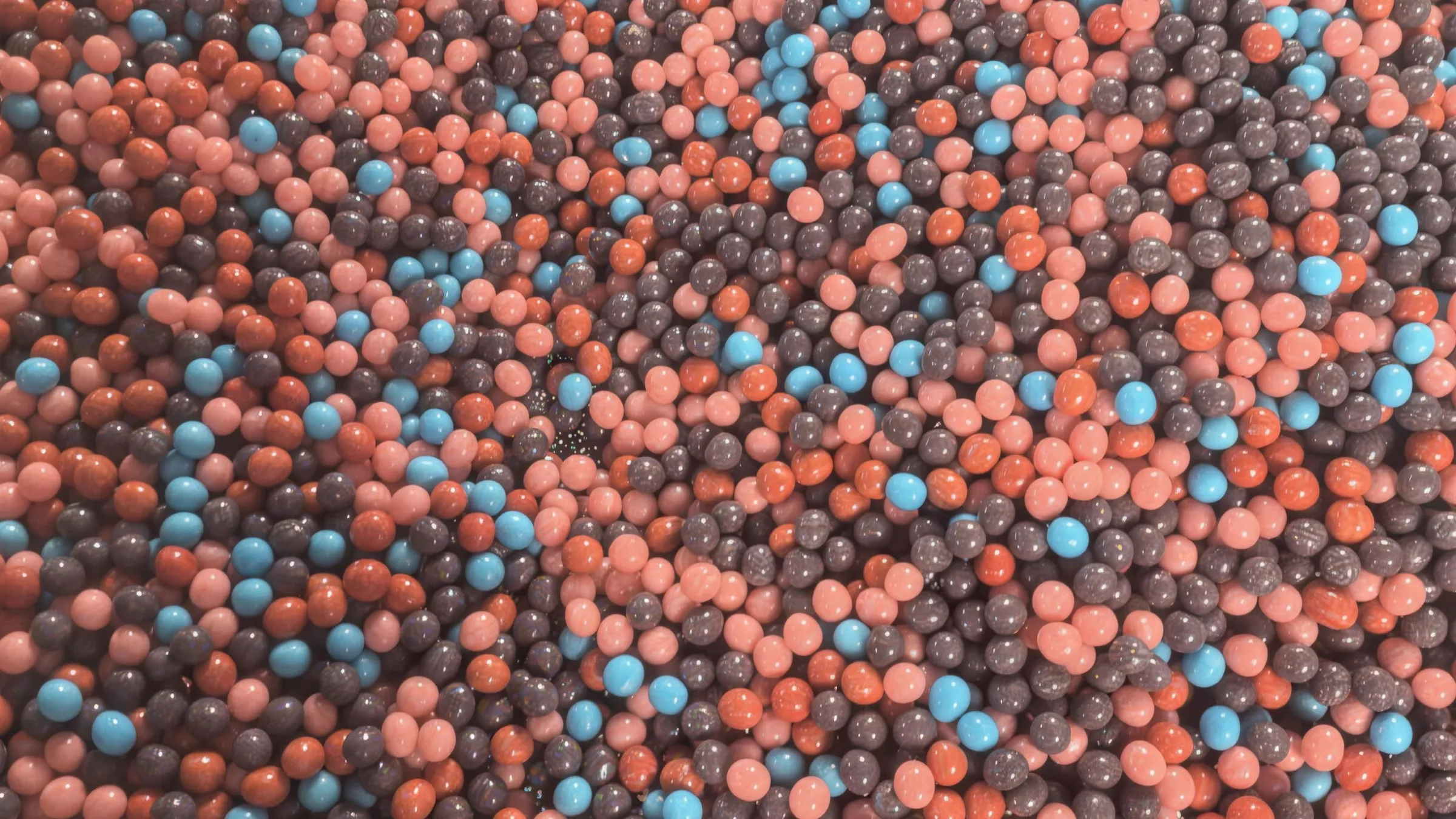 3.A pile of colorful candy-coated spherical candies